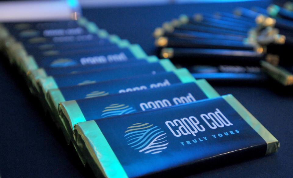 Candy bars are wrapped in the Cape Cod Chamber of Commerce's new logo and branding. Cape Cod Chamber of Commerce unveiled its new branding of the Cape during an event Wednesday afternoon at Pelham House Resort in Dennis Port.