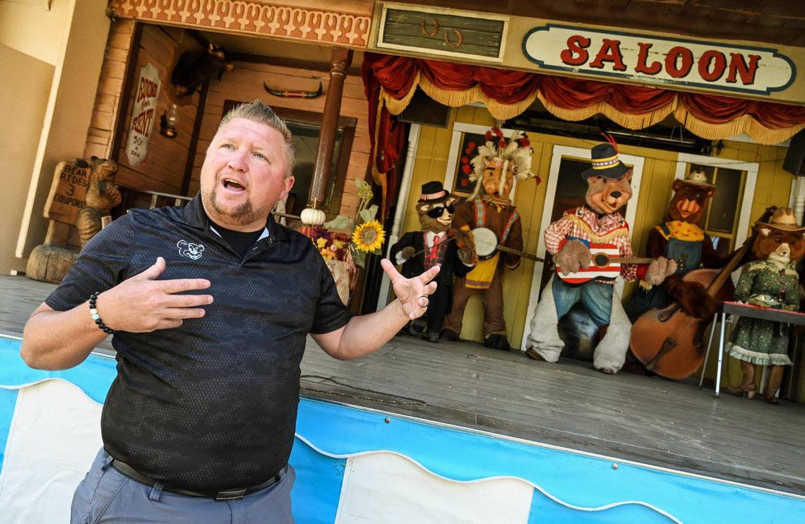 Davey Helm of Helm and Sons Amusements talks about his Bubba Bear and the Badland Band attraction at Playland in Roeding Park on Wednesday, April 19, 2023.