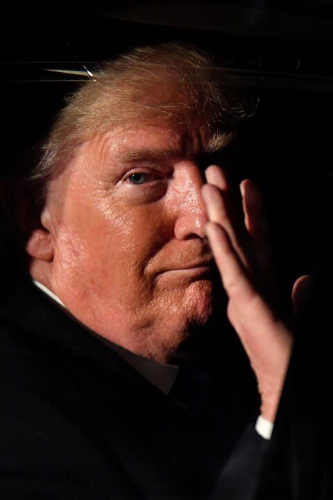 Mr Trump waves as he leaves Downing Street - Credit: Leon Neal&nbsp;/Getty