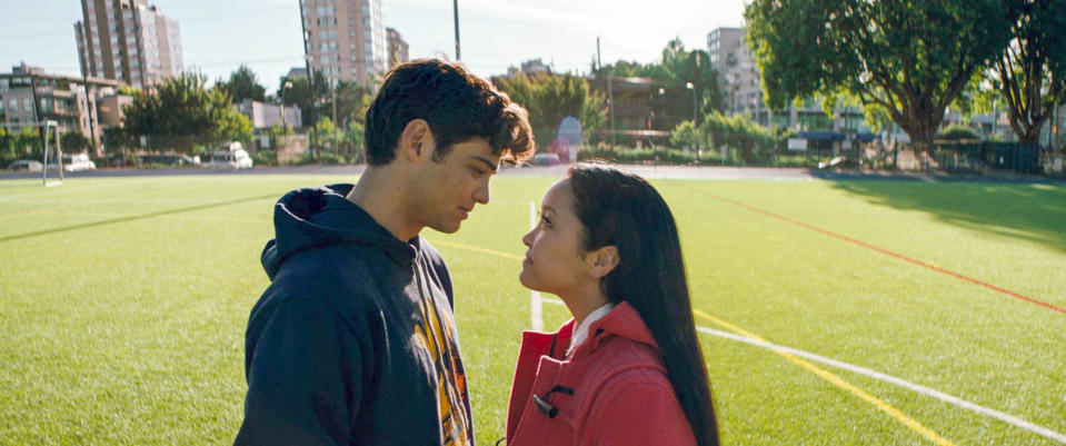 Peter and Lara Jean face each other on a soccer field