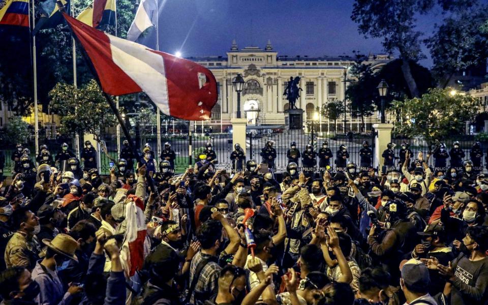 Demonstrators protest outside the Peruvian Congress after the election of Francisco Sagasti as the new president of the Peruvian Congress and future president of Peru - Shutterstock