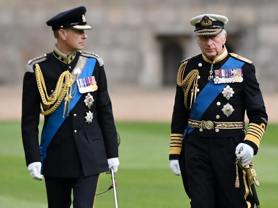 The Earl of Wessex, King Charles III, and Prince William stand together.