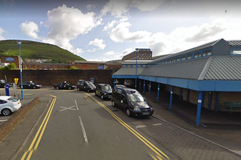 Taxis wait outside Port Talbot Bus Station