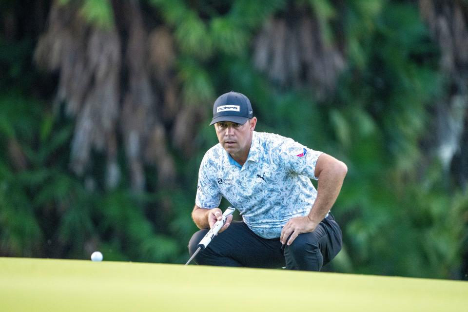 January 11, 2024; Honolulu, Hawaii, USA; Gary Woodland lines up his putt on the 10th hole during the first round of the Sony Open in Hawaii golf tournament at Waialae Country Club. Mandatory Credit: Kyle Terada-USA TODAY Sports