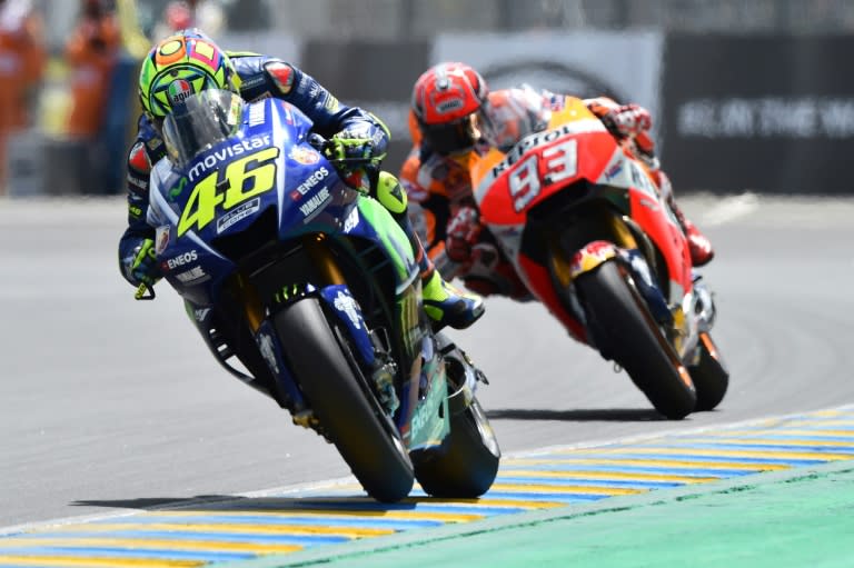 Italy's rider Valentino Rossi competes on his Movistar Yamaha ahead of Spain's rider Marc Marquez on his Repsol Honda during the French Grand Prix, on May 21, 2017