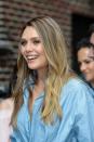 <p>Olsen made an appearance on <em>The Late Show With Stephen Colber</em> wearing beachy, blond waves and tawny eyeshadow that made her blue eyes pop. (Photo: Getty Images) </p>