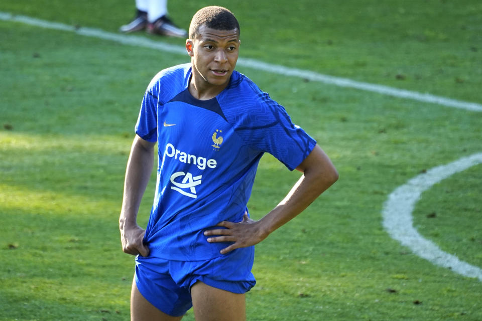 French soccer player Kylian Mbappe reacts during a training session with the French national team at the national soccer team training center in Clairefontaine, west of Paris, Tuesday, June 13, 2023. The door is open for Real Madrid to try signing Kylian Mbappé because the France superstar decided not to extend his Paris Saint-Germain contract into 2025. (AP Photo/Michel Euler)