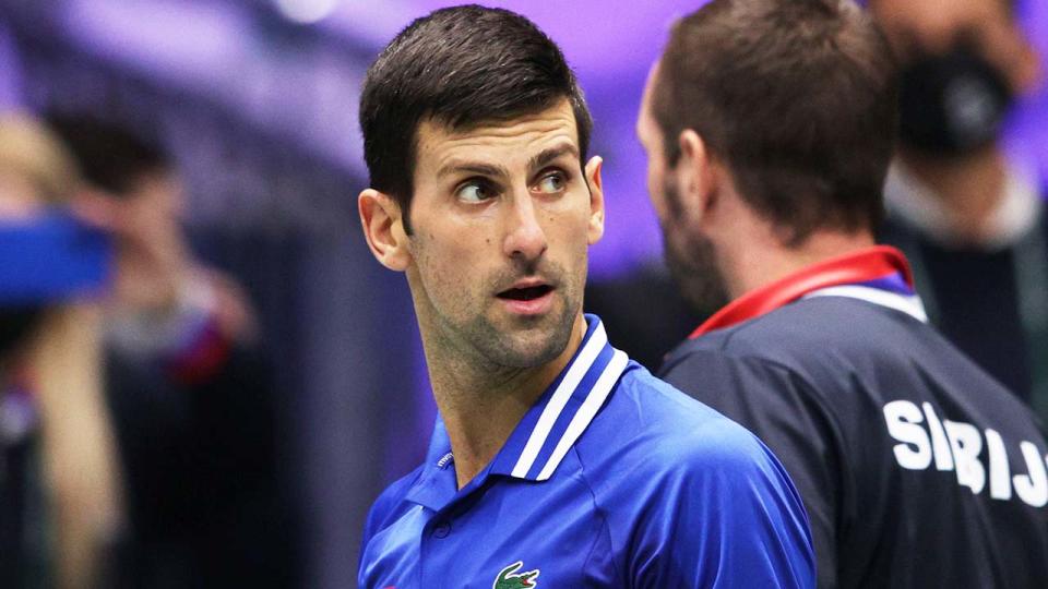 Novak Djokovic (pictured) looking at his player's box during a match.