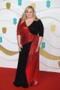 <p>Rebel Wilson was all smiles in a black-and-red wrap dress and Rupert Sanderson heels. </p>