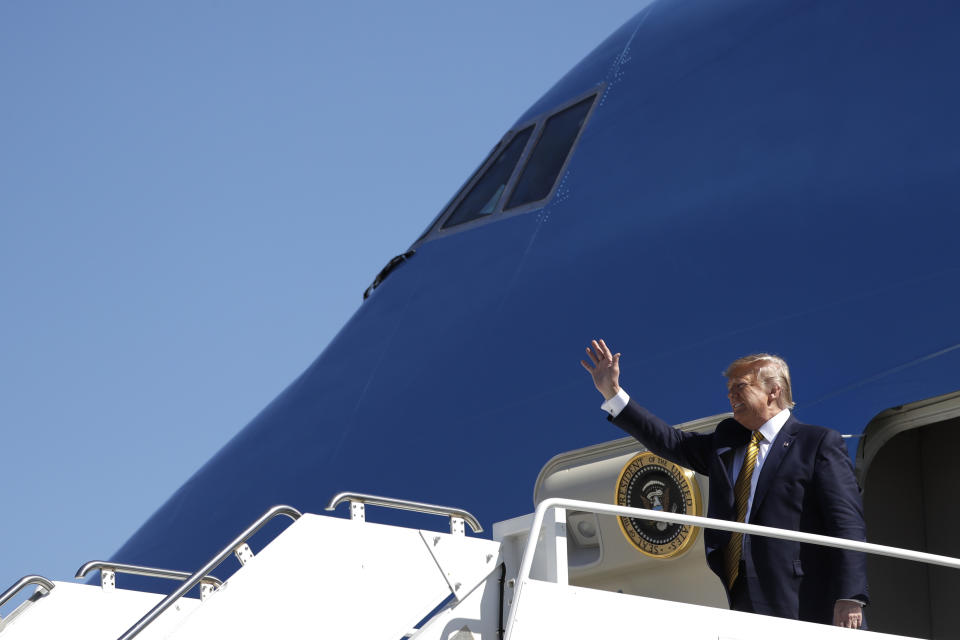 President Donald Trump arrives at Moffett Federal Airfield to attend a fundraiser, Tuesday, Sept. 17, 2019, in Mountain View, Calif. (AP Photo/Evan Vucci)