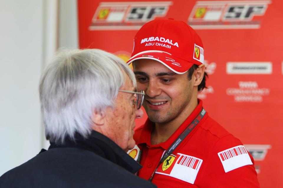 Felipe Massa (right) is suing F1, the FIA and ex-F1 supremo Bernie Ecclestone (left) (Getty Images)