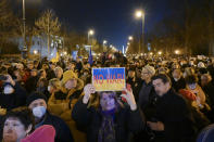 FILE - People protest against Russia's military operation in Ukraine during a demonstration organized by the Hungarian opposition parties in front of the Russian Embassy in Budapest, Hungary, Thursday, Feb. 24, 2022. Hungary’s right-wing nationalist prime minister, Viktor Orban, has nurtured close political and economic ties with Russia for more than a decade. But following Russia's large-scale invasion of Ukraine, Hungary's neighbor, Orban is facing growing pressure to change course. (Szilard Koszticsak/MTI via AP, File)