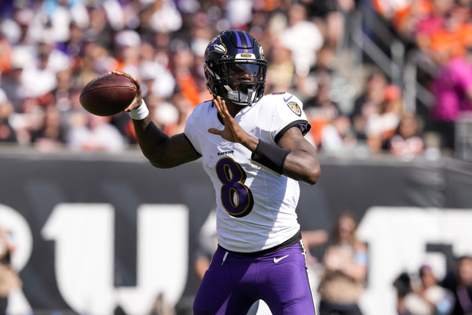 Lamar Jackson and the Ravens held on for an overtime win. (AP Photo/Jeff Dean)