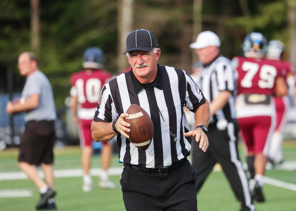 Dover's Richard Driscoll officiates the CHad football game Friday, June 23, 2023 at St. Anselm College in Manchester.