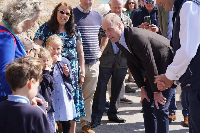The Duke of Cornwall, when in Cornwall, speaks to school children -Credit:Getty Images
