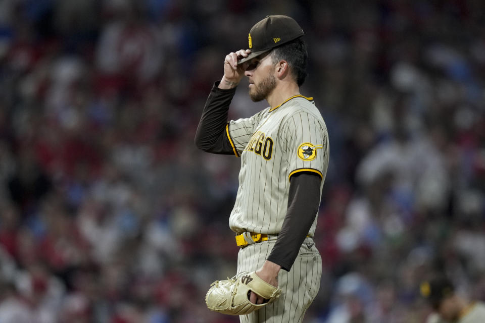 San Diego Padres starting pitcher Joe Musgrove reacts after giving up a two-run single to Philadelphia Phillies' Jean Segura during the fourth inning in Game 3 of the baseball NL Championship Series between the San Diego Padres and the Philadelphia Phillies on Friday, Oct. 21, 2022, in Philadelphia. (AP Photo/Matt Slocum)