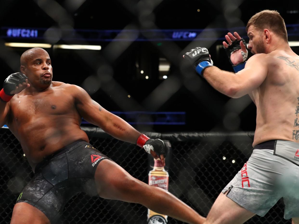 Daniel Cormier (left) and Stipe Miocic will fight for the UFC heavyweight title for the third time: Getty Images
