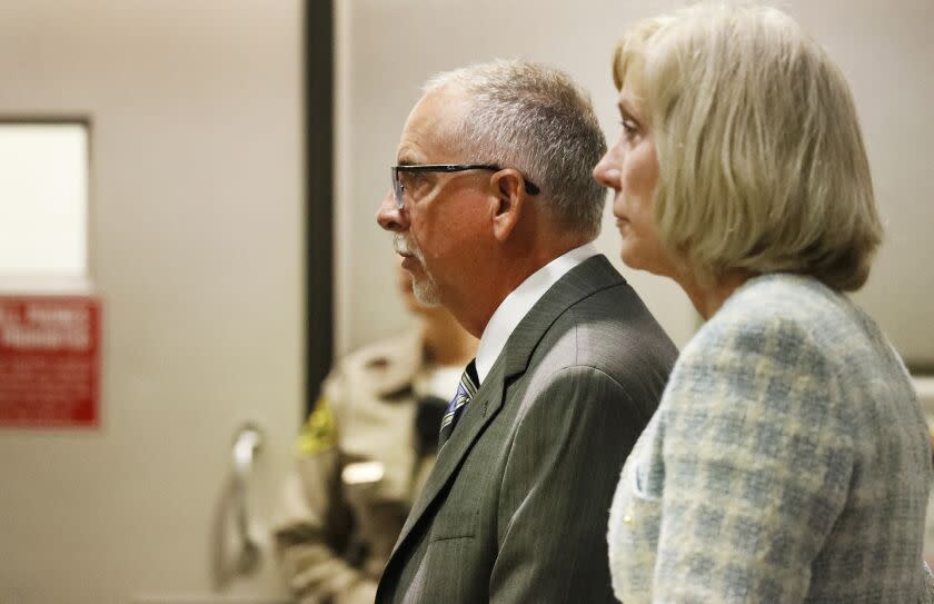 LOS ANGELES, CA - JUNE 26, 2019 - Dr. James Heaps, right, a former UCLA obstetrician-gynecologist appears in the Airport Branch Courthouse for a hearing June 26, 2019 with his attorney's Andrew Reed Flier and Tracy Green, accused of sexually battering patients. (Al Seib / Los Angeles Times)