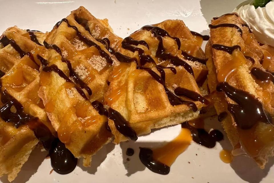 The Twisted Lime Restaurant & Bar in Vero Beach serves churro waffles as a dessert.