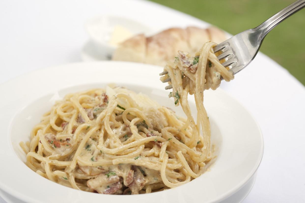 Fork of Spaghetti Carbonara, close up.