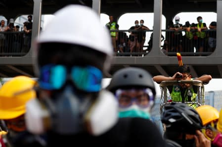 Demonstrators attend a protest in Hong Kong