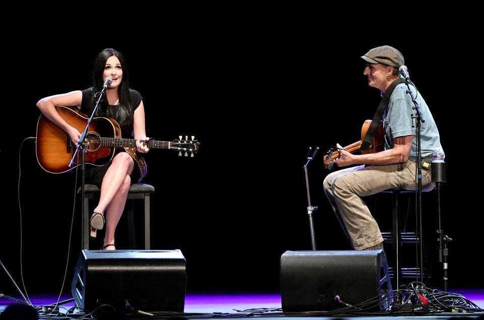 LOS ANGELES, CA - SEPTEMBER 27: Singer Kacey Musgraves and Rock and Roll Hall of Fame membebr James Taylor  perform onstage during All For The Hall Los Angeles A benefit concert presented by The Country Music Hall of Fame And Museum  at The Novo by Microsoft on September 27, 2016 in Los Angeles, California.  (Photo by Mike Windle/Getty Images for Country Music Hall of Fame and Museum)