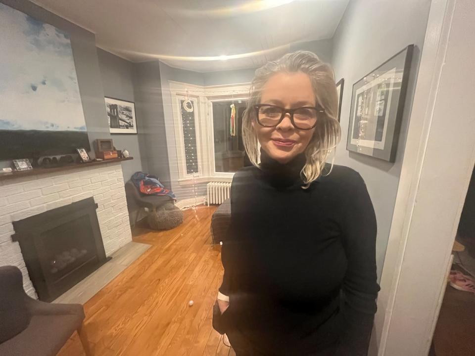 Kristin Shensel, a real estate broker, said her car, a 2019 Range Rover, was stolen three times since January 2023. A rental car she used last year, a Jaguar, was also stolen.  (Dale Manucdoc/CBC - image credit)