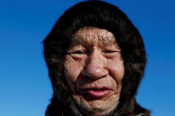 A herder of the agricultural cooperative organisation "Harp" takes part in the early voting in remote areas ahead of the presidential election, at a reindeer camping ground, about 250 km south of Naryan-Mar, in Nenets Autonomous District, Russia, March 4, 2018. REUTERS/Sergei Karpukhin