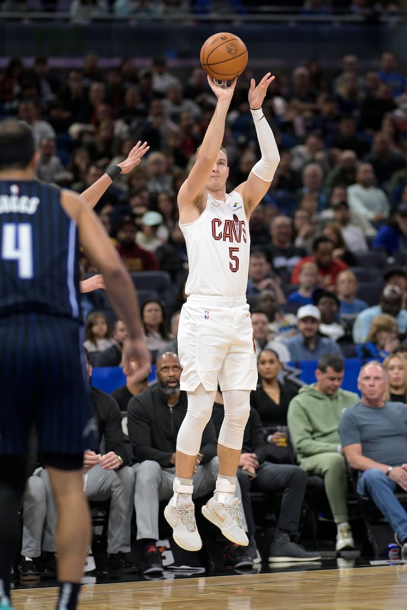 Cleveland Cavaliers guard Sam Merrill (5) shoots a 3-pointer during game against the Orlando Magic, Monday, Jan. 22, 2024, in Orlando, Fla. | Phelan M. Ebenhack, Associated Press