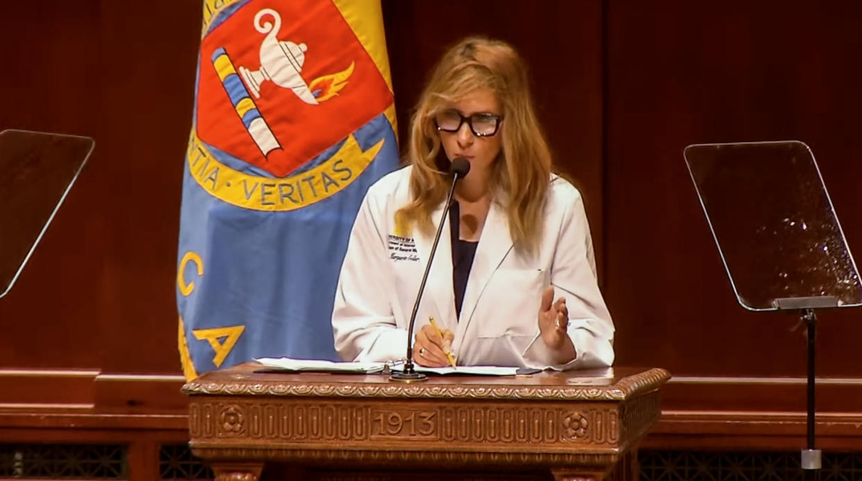 Image: Assistant Professor of Medicine, Kristin Collier speaks at the University of Michigan White Coat ceremony in Ann Arbor, Mich. on July 24, 2022. (Michigan Medicine)