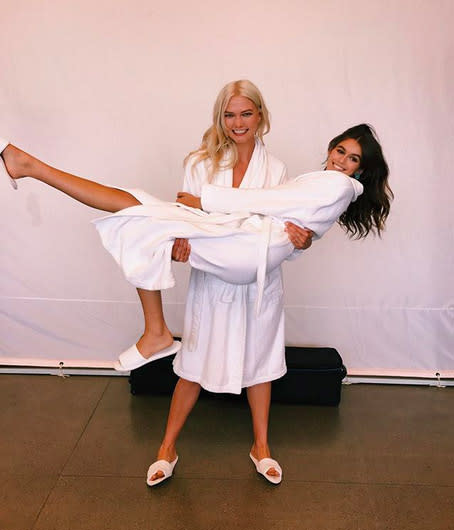 <p>Kaia has shared some behind-the-seams shots from fashion week. Here she is getting a lift from her “big sis” Karlie Kloss — or should we rename her Karlie <em>“Muscles”</em> Kloss? (Photo: <a rel="nofollow noopener" href="https://www.instagram.com/p/BYtKT0HBoXu/?hl=en&taken-by=kaiagerber" target="_blank" data-ylk="slk:Kaia Gerber via Instagram;elm:context_link;itc:0;sec:content-canvas" class="link ">Kaia Gerber via Instagram</a>) </p>