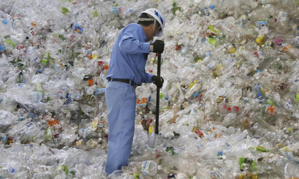 <span>Photograph: Koji Sasahara/AP</span>