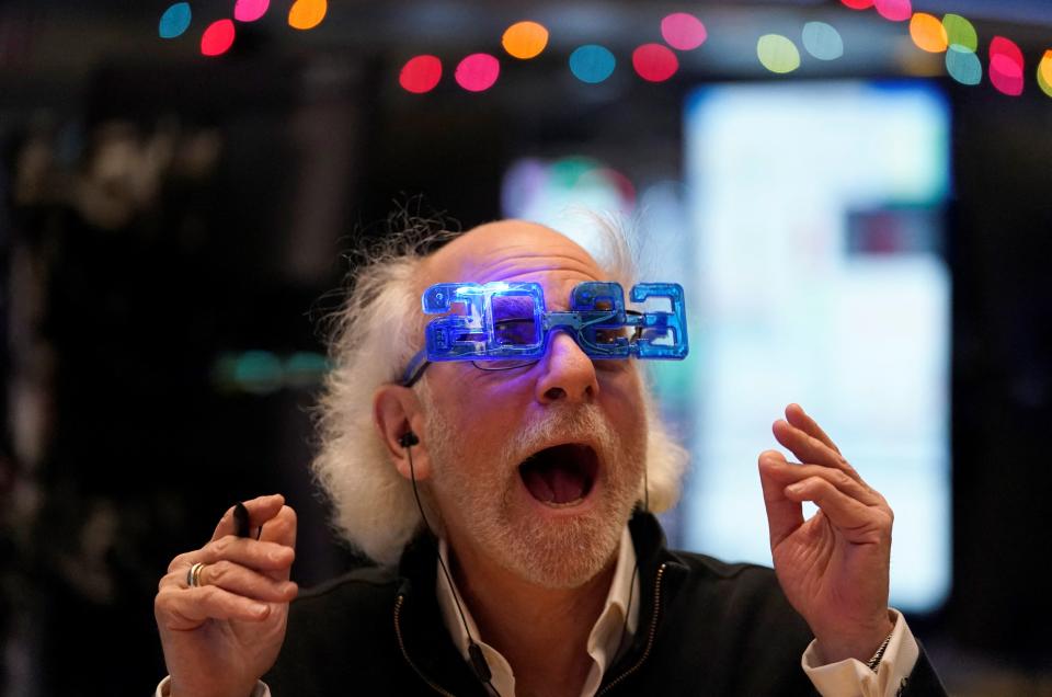 Stock trader Peter Tuchman reacts on the floor of the New York Stock Exchange at the closing bell on December 30, 2022 in New York. - Wall Street stocks marked a gloomy end to 2022, slumping to close lower in their worst annual showing in years. Surging inflation and steep interest rate hikes to cool demand have battered markets and investor sentiment this year, on top of global shocks like Russia&#39;s invasion of Ukraine. (Photo by TIMOTHY A. CLARY / AFP) (Photo by TIMOTHY A. CLARY/AFP via Getty Images)