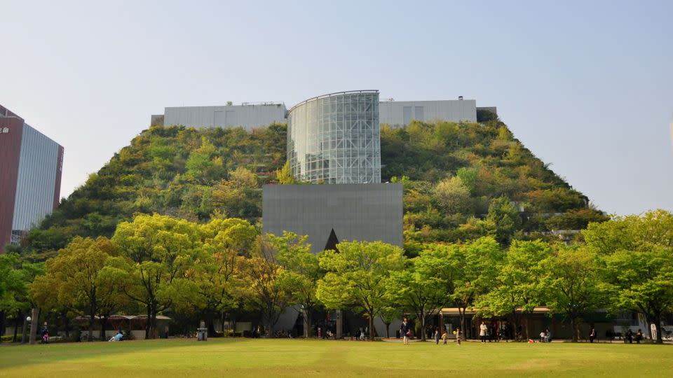 Urban structures don't have to be concrete towers. ACROS Fukuoka Prefectural International Hall in Fukuoka, Japan, is an example of a green building in the heart of the city. - Shutterstock