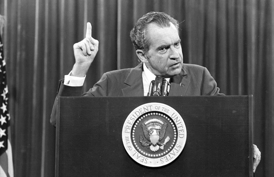 FILE - In this Nov. 17, 1973 file photo, President Richard Nixon speaks near Orlando, Fla. to the Associated Press Managing Editors annual meeting. Nixon told the APME "I am not a crook." There were two men in 1980s Manhattan who craved validation — one a past president, one a future president. That’s how a thirty-something Donald Trump and a seventy-ish Richard Nixon struck up a decade-long correspondence in the 1980s that meandered from football and real estate to Vietnam and media strategy. Their letters are being revealed for the first time in an exhibit that opens Thursday at the Richard Nixon Presidential Library & Museum. (AP Photo)