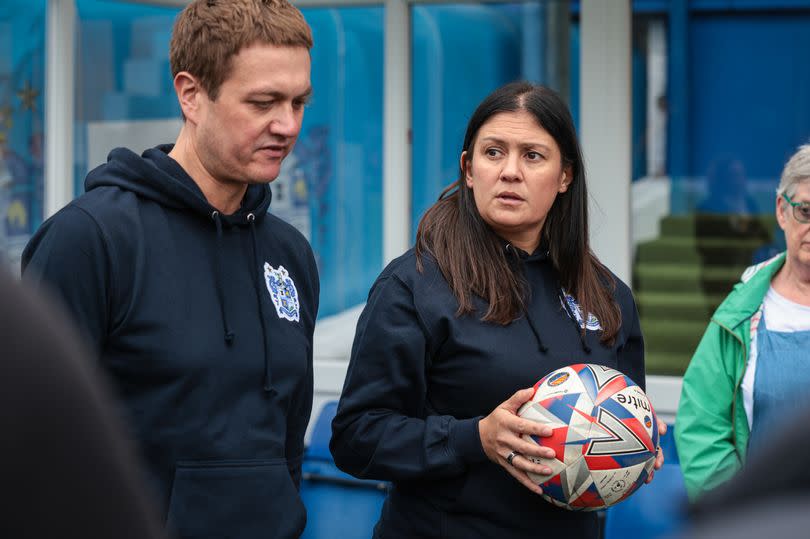 Bury North MP, James Frith (L), and the new Secretary of State for Culture, Media and Sport, and MP for Wigan, Lisa Nandy, makes an appearance at Bury FCs Gigg Lane.