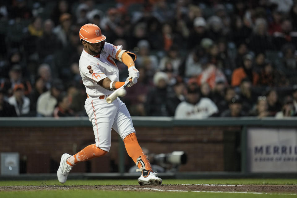 San Francisco Giants' Luis Matos hits an RBI double against the Arizona Diamondbacks during the sixth inning of a baseball game Tuesday, Aug. 1, 2023, in San Francisco. (AP Photo/Godofredo A. Vásquez)