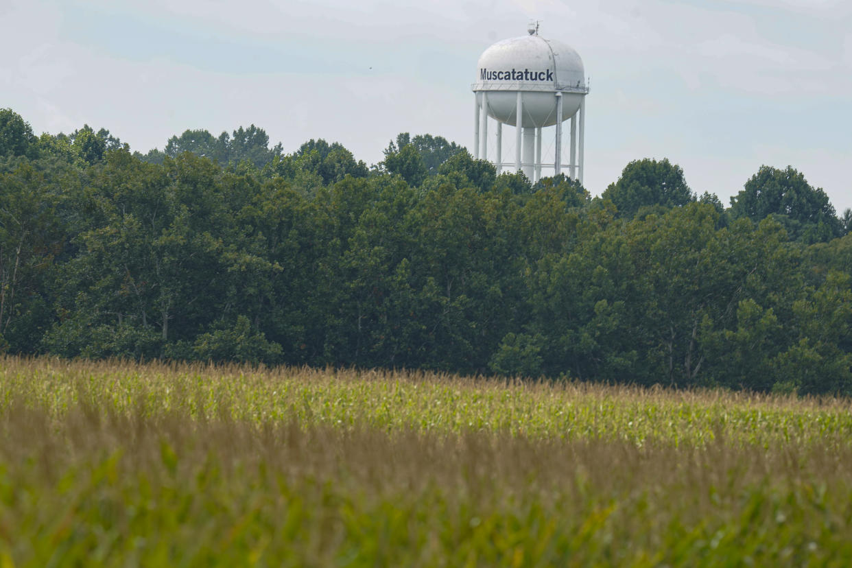 The water tower at the Muscatatuck Urban Training Center, surrounded by corn fields, is shown in Butlerville, Ind., Monday, Aug. 29, 2022. Three members of the Dutch Commando Corps, who were training at the center, were shot outside their hotel in downtown Indianapolis early Saturday morning. The Dutch Defense Ministry says that one has died. (AP Photo/Michael Conroy)