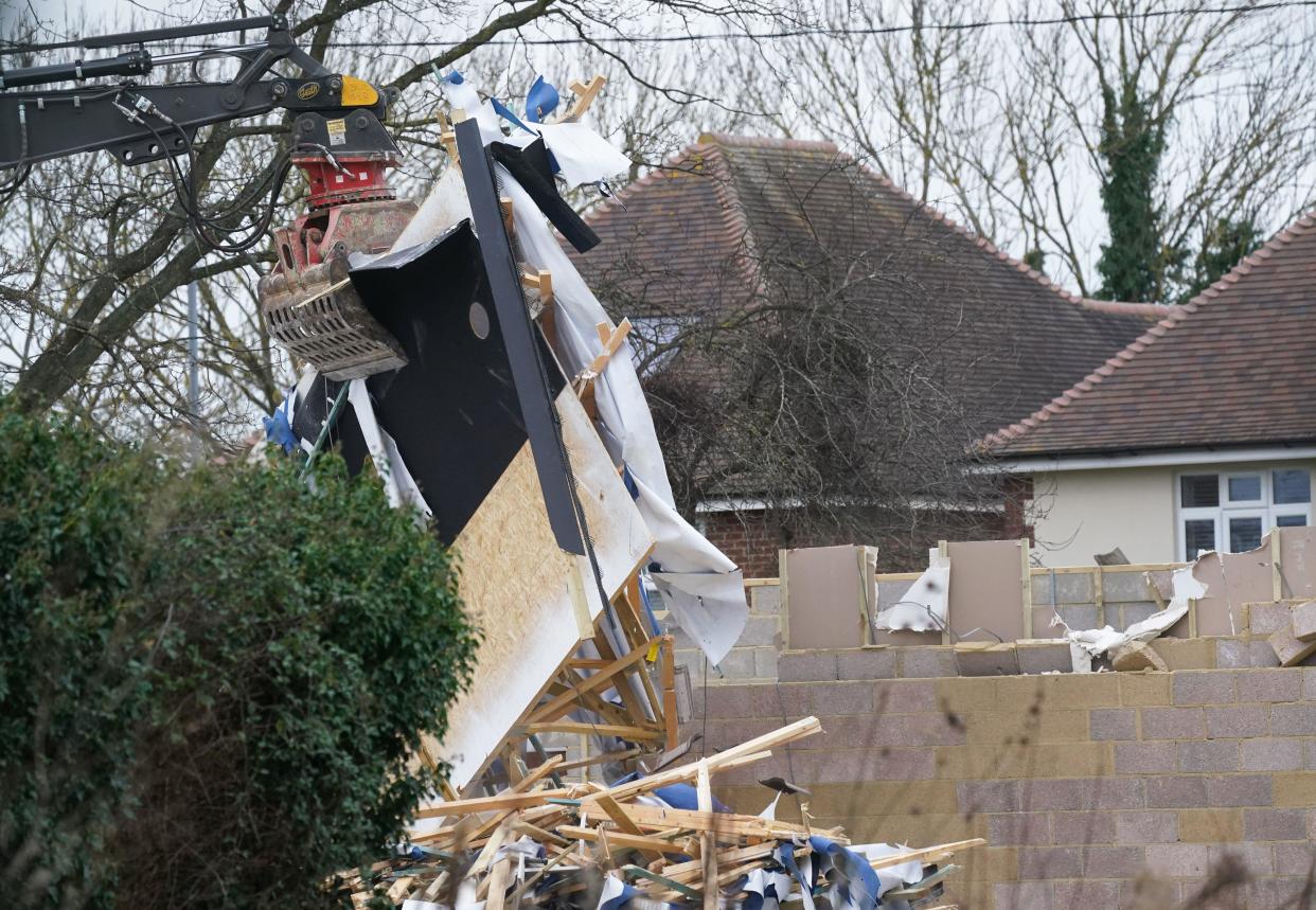 Work continues to demolish an unauthorised spa pool block at the home of Hannah Ingram-Moore, the daughter of the late Captain Sir Tom Moore, at Marston Moretaine, Bedfordshire. Picture date: Monday February 5, 2024.