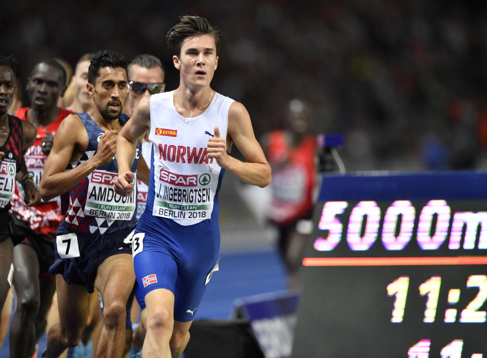 Norway's Jakob Ingebrigtsen competes in the men's 5000-meter final at the European Athletics Championships at the Olympic stadium in Berlin, Germany, Saturday, Aug. 11, 2018. (AP Photo/Martin Meissner)