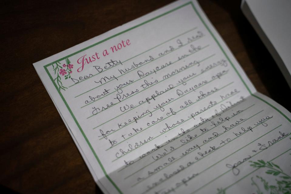 A handwritten letter sits on Betty Henderson's desk at Angels of Essence Day Care in Detroit on Jan. 19, 2023. Letters of support and encouragement have been sent to Henderson by strangers in Michigan, New York, California and throughout other parts of the country.