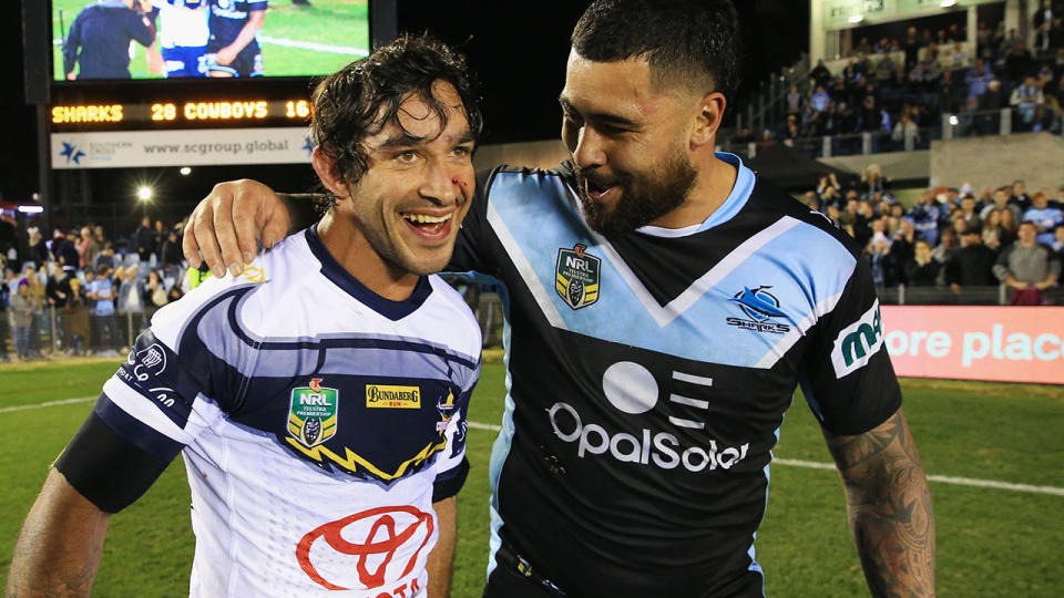 Johnathan Thurston is hugged by Andrew Fifita after his last game at Cronulla. (Photo by Mark Evans/Getty Images)