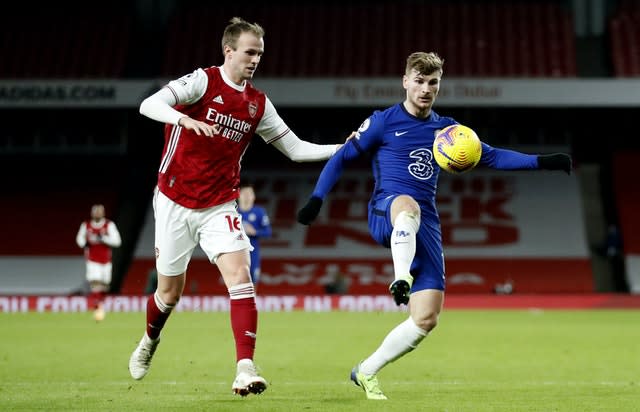 Timo Werner shields the ball from Rob Holding