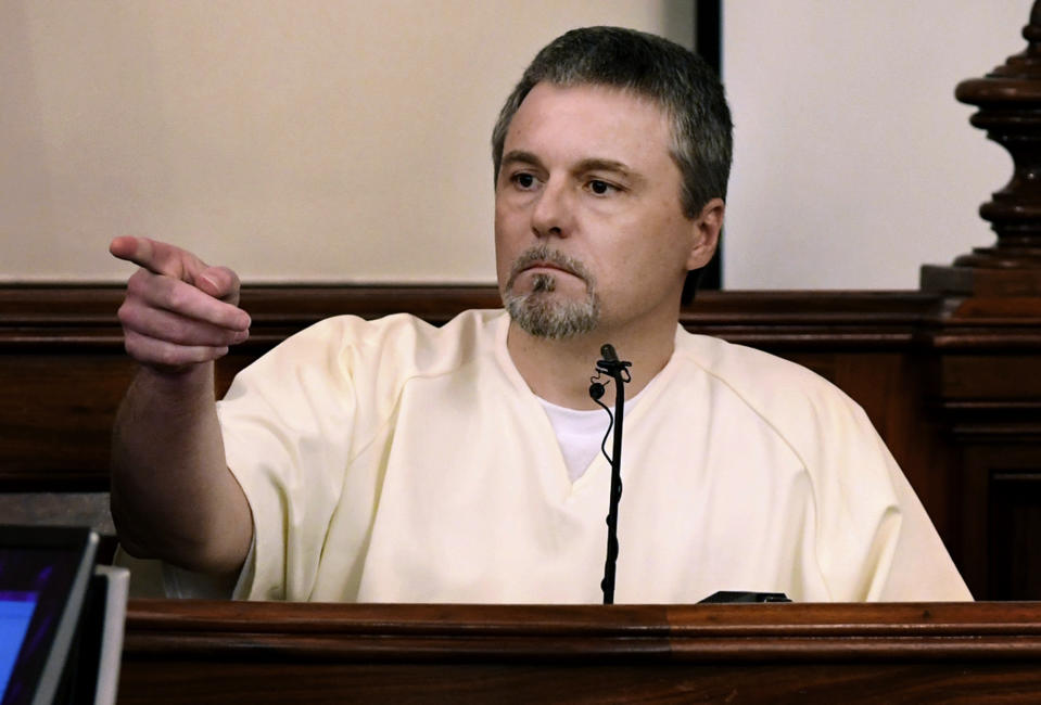 FILE - Jason Autry identifies Zachery Adams during his testimony on day four of Adams' murder trial on Sept. 14, 2017, in Savannah, Tenn. Autry, a convicted felon who was released from prison after giving key trial testimony about the slaying of Tennessee nursing student Holly Bobo, plans to change his plea to guilty on weapons charges filed shortly after he was granted his freedom, according to an Oct. 3, 2022, court filing obtained by The Associated Press. (Kenneth Cummings/The Jackson Sun via AP, Pool, File)