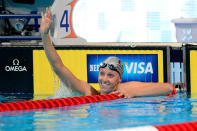 OMAHA, NE - JUNE 25: Dana Vollmer reacts after she set a new american record while competing in heat 17 of the Women's 100 m Butterfly during the 2012 U.S. Olympic Swimming Team Trials at CenturyLink Center on June 25, 2012 in Omaha, Nebraska. (Photo by Jamie Squire/Getty Images)