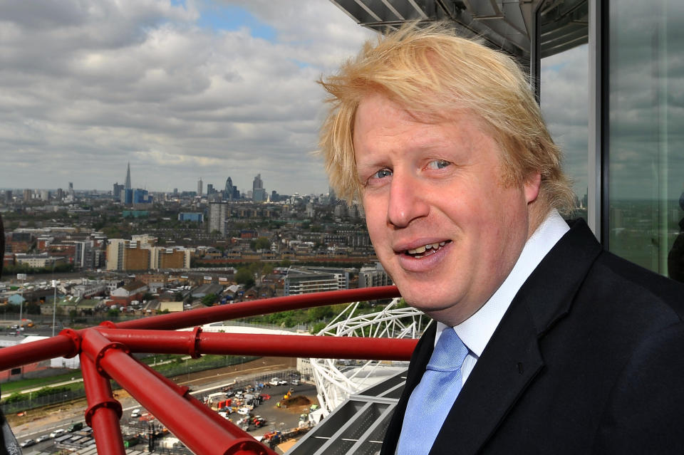 London Mayor Boris Johnson looks out from the public viewing platform of the newly completed ArcelorMittal Orbit, the Anish Kapoor and Cecil Balmond-designed sculpture that that will stand at the heart of the London 2012 Olympic and Paralympic Park.