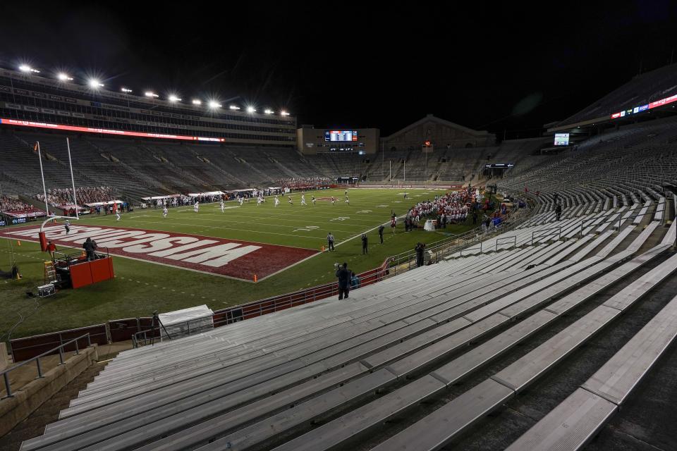 The stands at Camp Randall Stadium are empty during the first half of an NCAA college football game between Wisconsin and Illinois Friday, Oct. 23, 2020, in Madison, Wis. (AP Photo/Morry Gash)