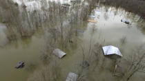 This drone photo provided by Hardin County Fire Department, Savannah, Tenn., shows flooding on Saturday, Feb. 15, 2020 in Savannah, Tenn. Days and days of heavy rain have created a dilemma for authorities managing dams along swollen rivers in Mississippi and Tennessee. (Melvin Martin /Hardin County Fire Department, Savannah, Tenn. via AP)