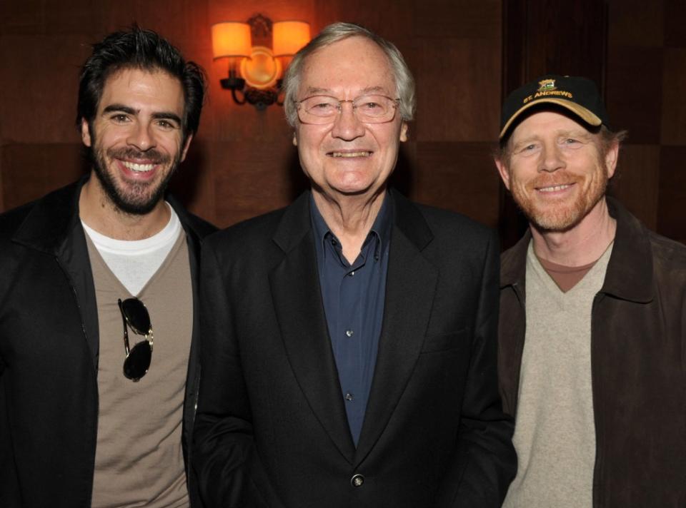 Roger Corman stands next to Eli Roth (left) and director Ron Howard at the “Inglourious Basterds” lunch in 2010. WireImage