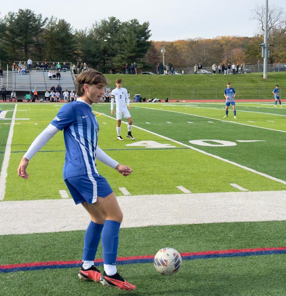 Holmdel's Tyler Gravier prepares a pass during the Hornets' 1-0 victory over Manasquan on Saturday.
